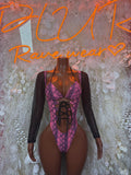 Long-sleeve one-piece bodysuit with purple snake print, lace-up front and sheer black sleeves