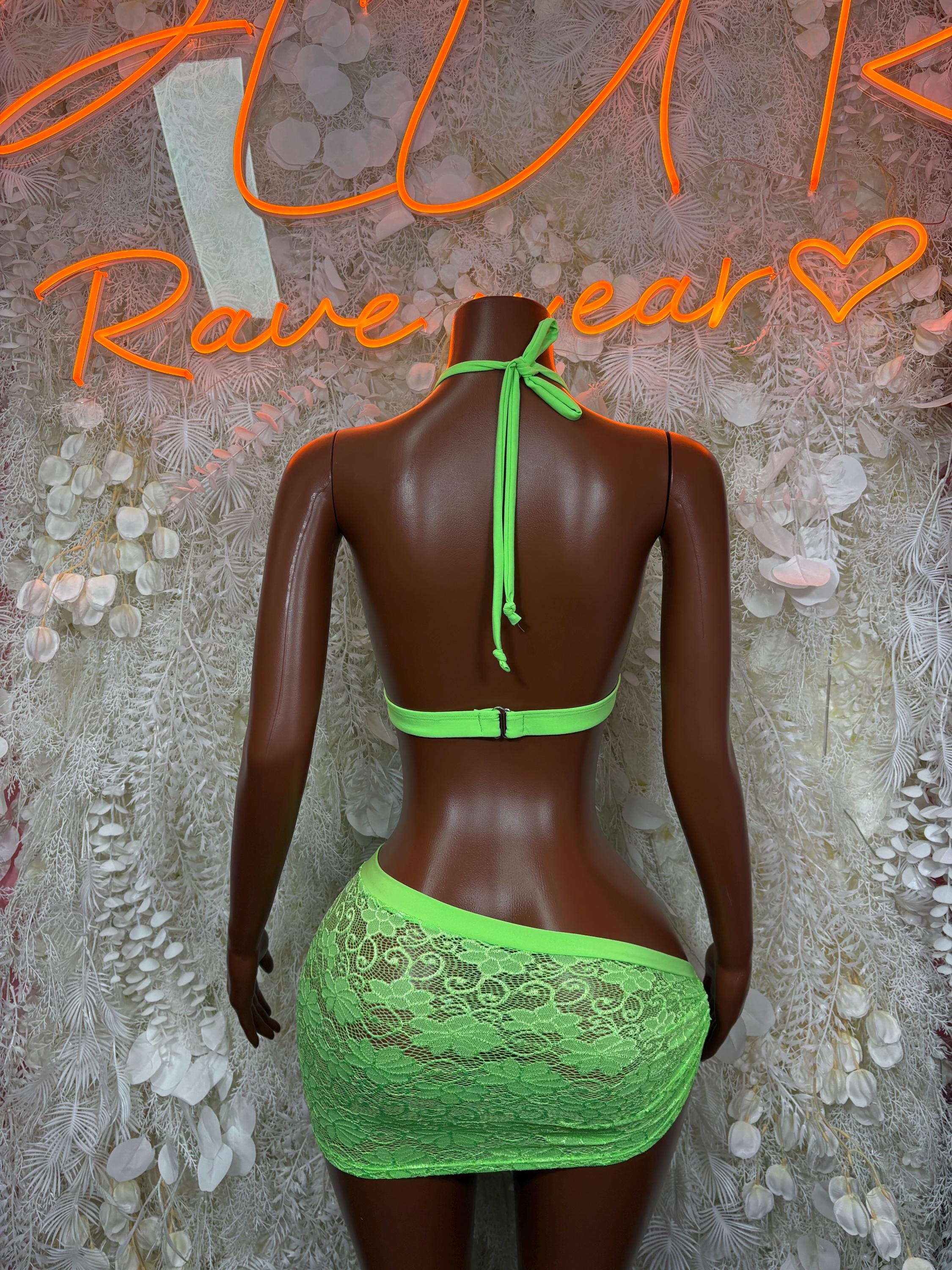Neon green backless bikini top and mini skirt set with lace-up straps