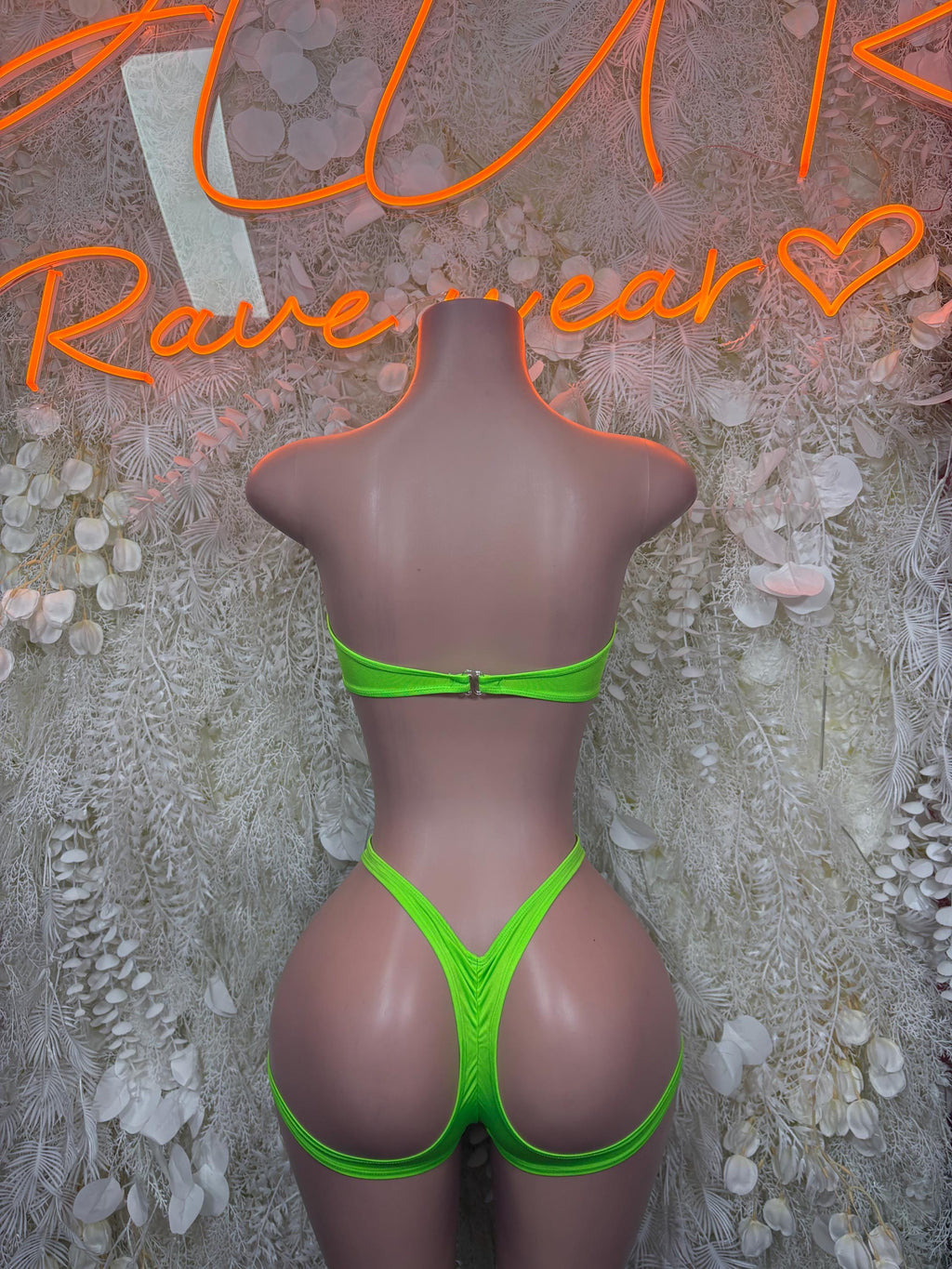 Neon green two-piece set with strappy back bandeau and high-cut matching bottoms