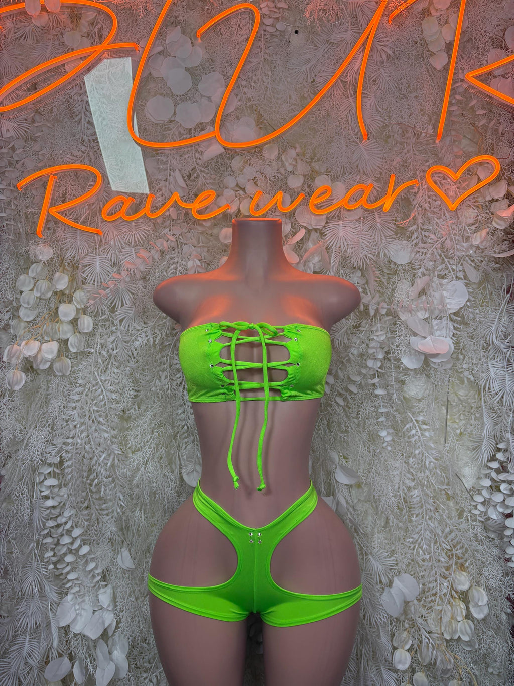 Neon green rave two-piece set with lace-up bandeau top and high-cut matching bottoms