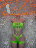 Neon green rave two-piece set with lace-up bandeau top and high-cut matching bottoms