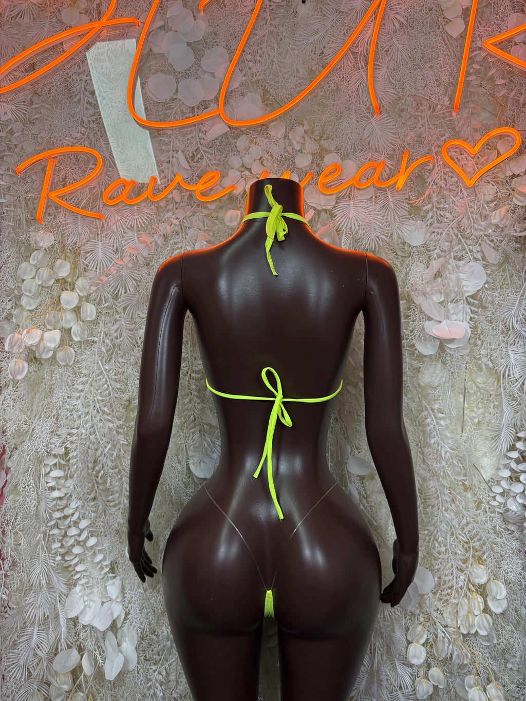 Neon green bikini backless set with tie-neck strings and matching side ties.