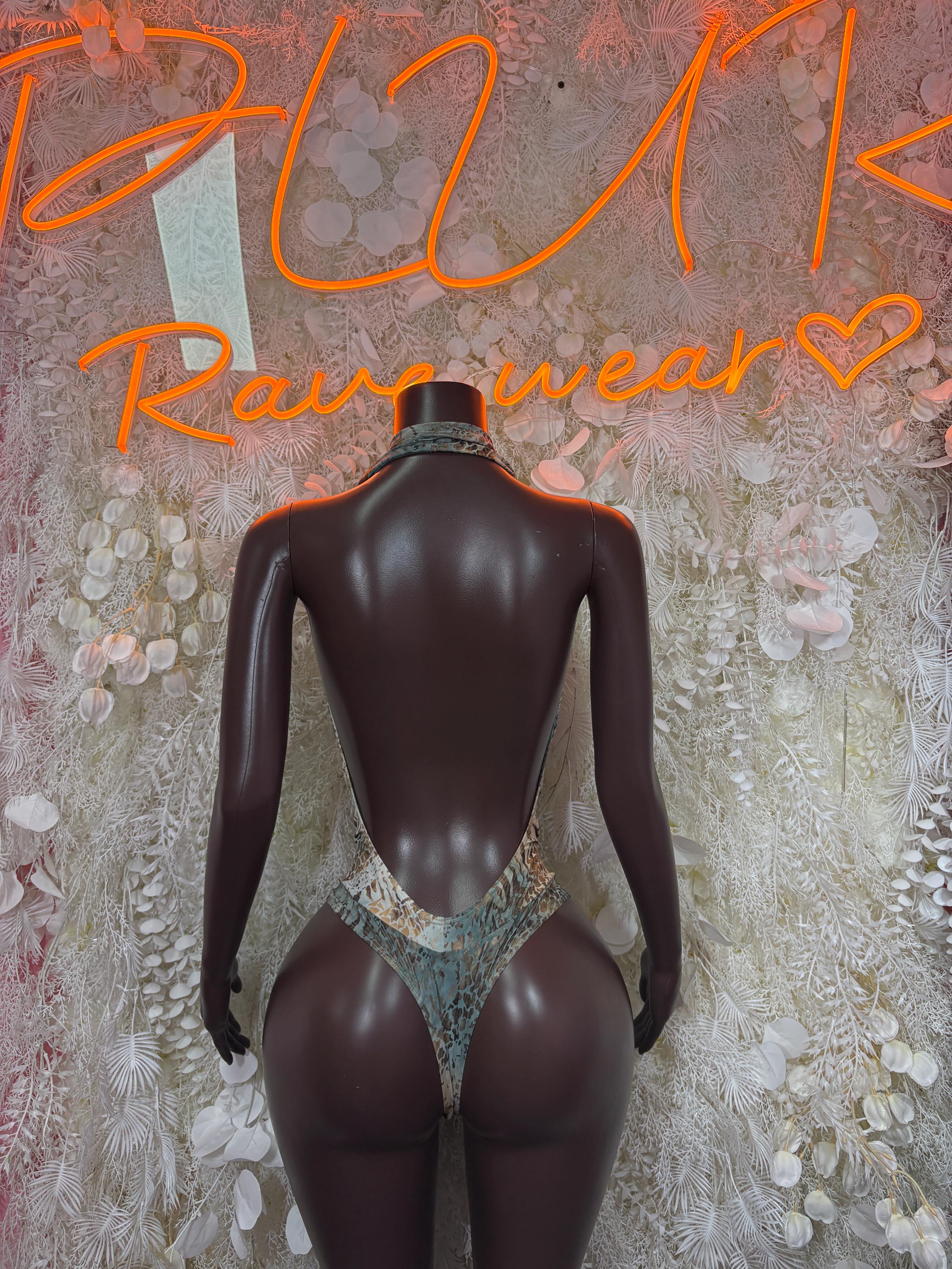 Back view of multicolor patterned dance bodysuit with open back
