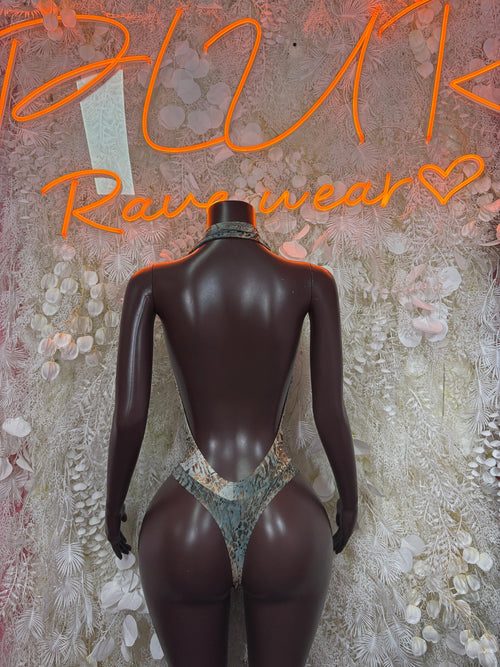 Back view of multicolor patterned dance bodysuit with open back