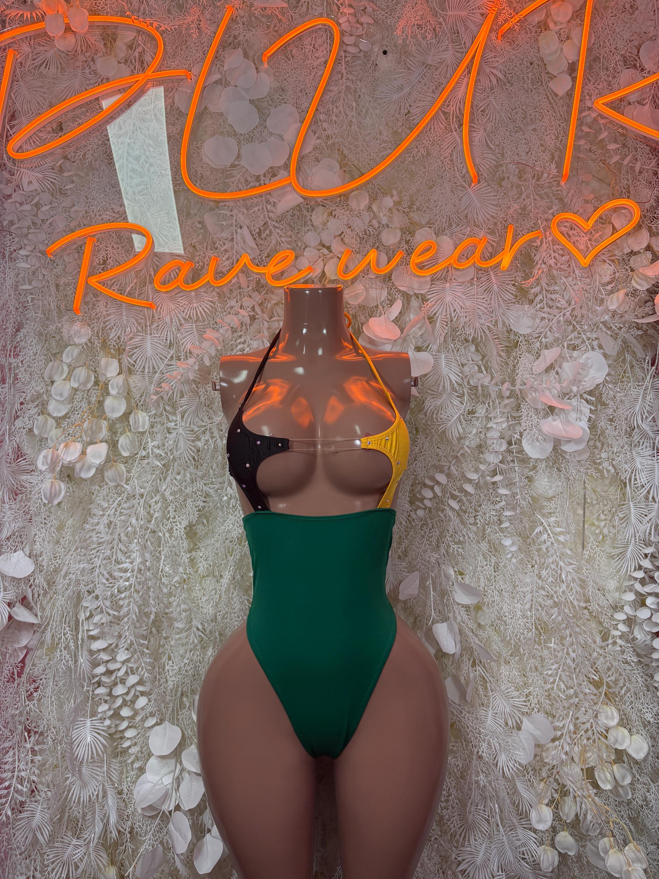 Green one-piece bodysuit with black dotted cups and halter straps