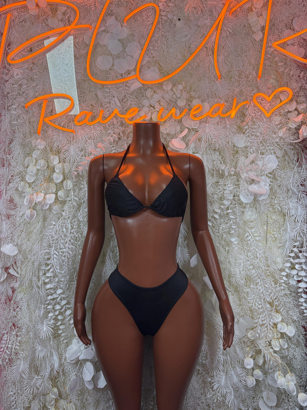 Black two-piece bikini with underwire triangle cups and matching high-cut bottoms