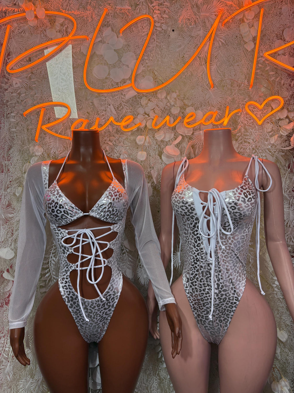 Silver cheetah-print bodysuit with crisscross lace-up front, sheer sleeves