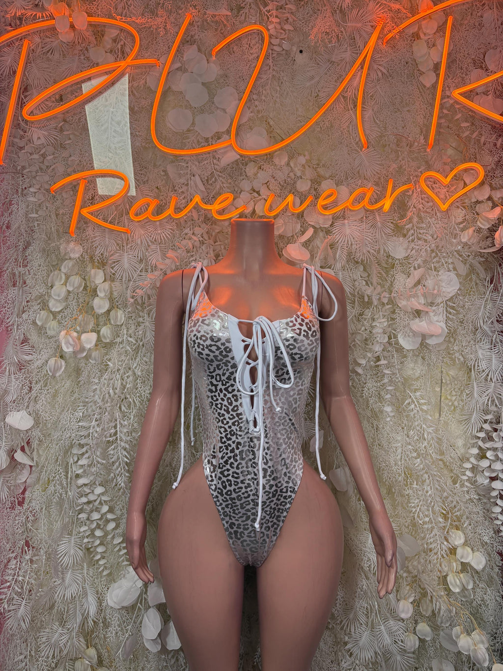 Silver cheetah-print lace-up bodysuit with thin straps and thong cut
