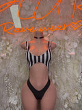 Striped cutout bodysuit, sleeveless black-and-white stripes with front V cutout