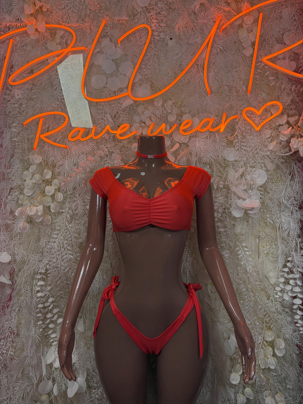 Red two-piece bikini set with choker; ruched bra top and tied string bottoms