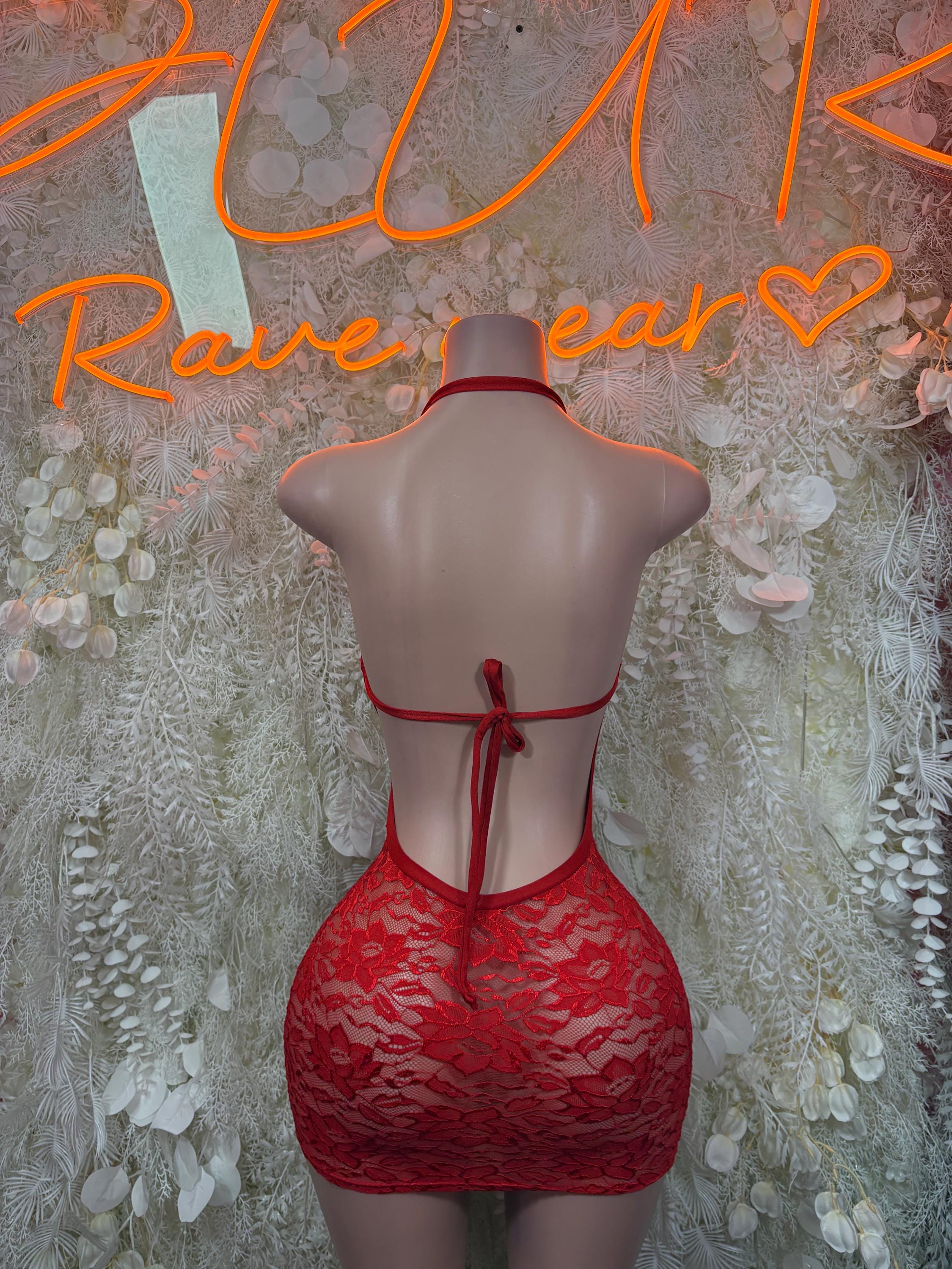 Red lace mesh mini dress with open back and halter straps, tie-back detail.