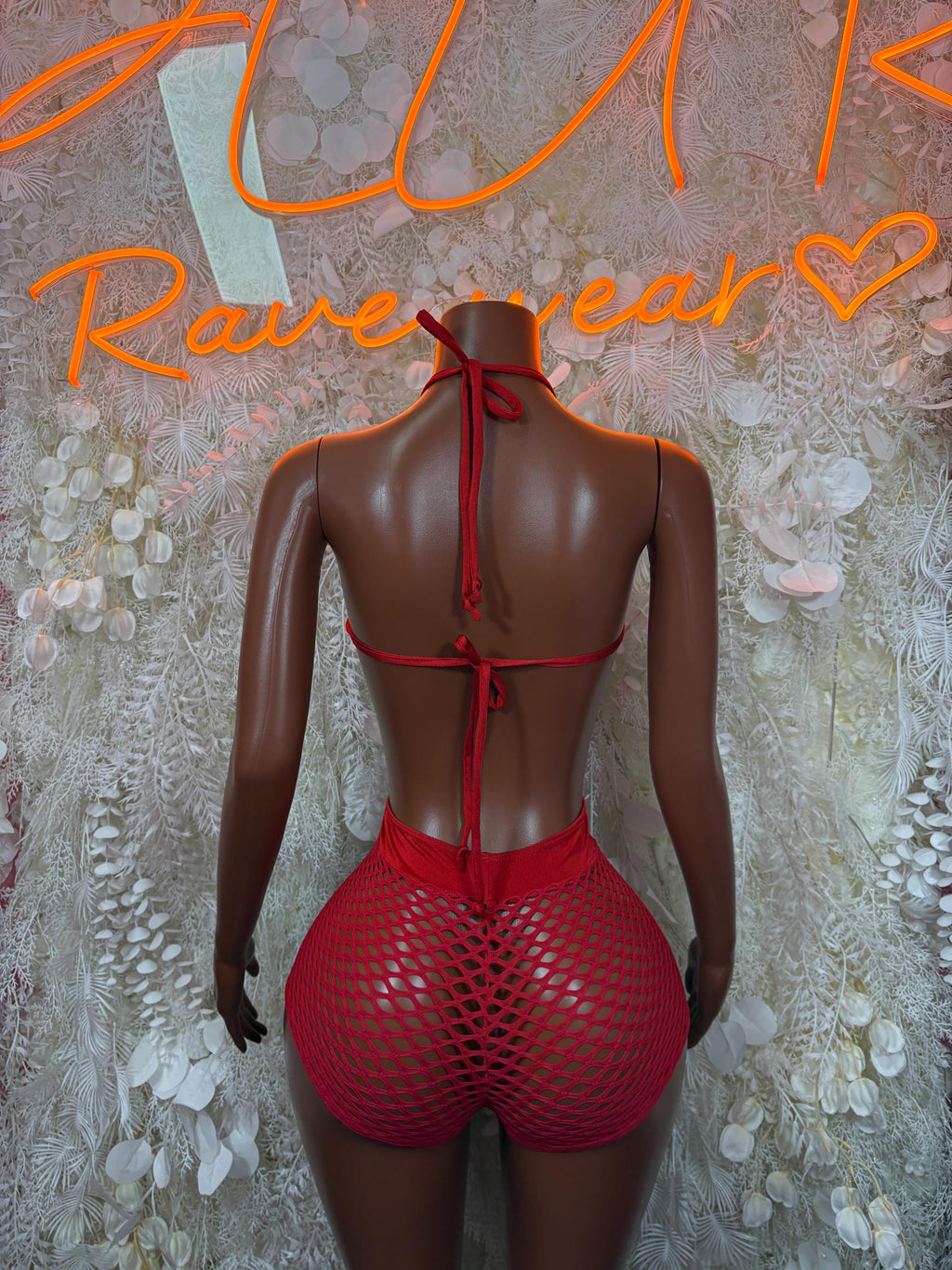 Red fishnet bodysuit back view with open back straps and bow tie
