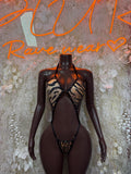 Tiger-print halter bodysuit with open sides, front hook closure, black mesh lingerie