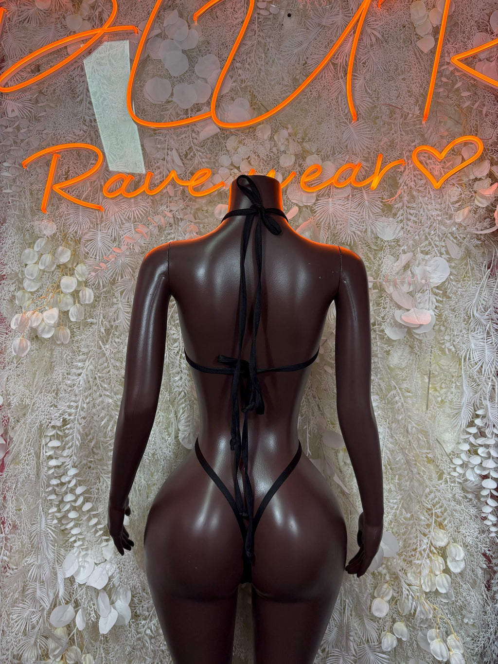 Tiger-print halter bodysuit with crisscross back straps and open back, black mesh lingerie