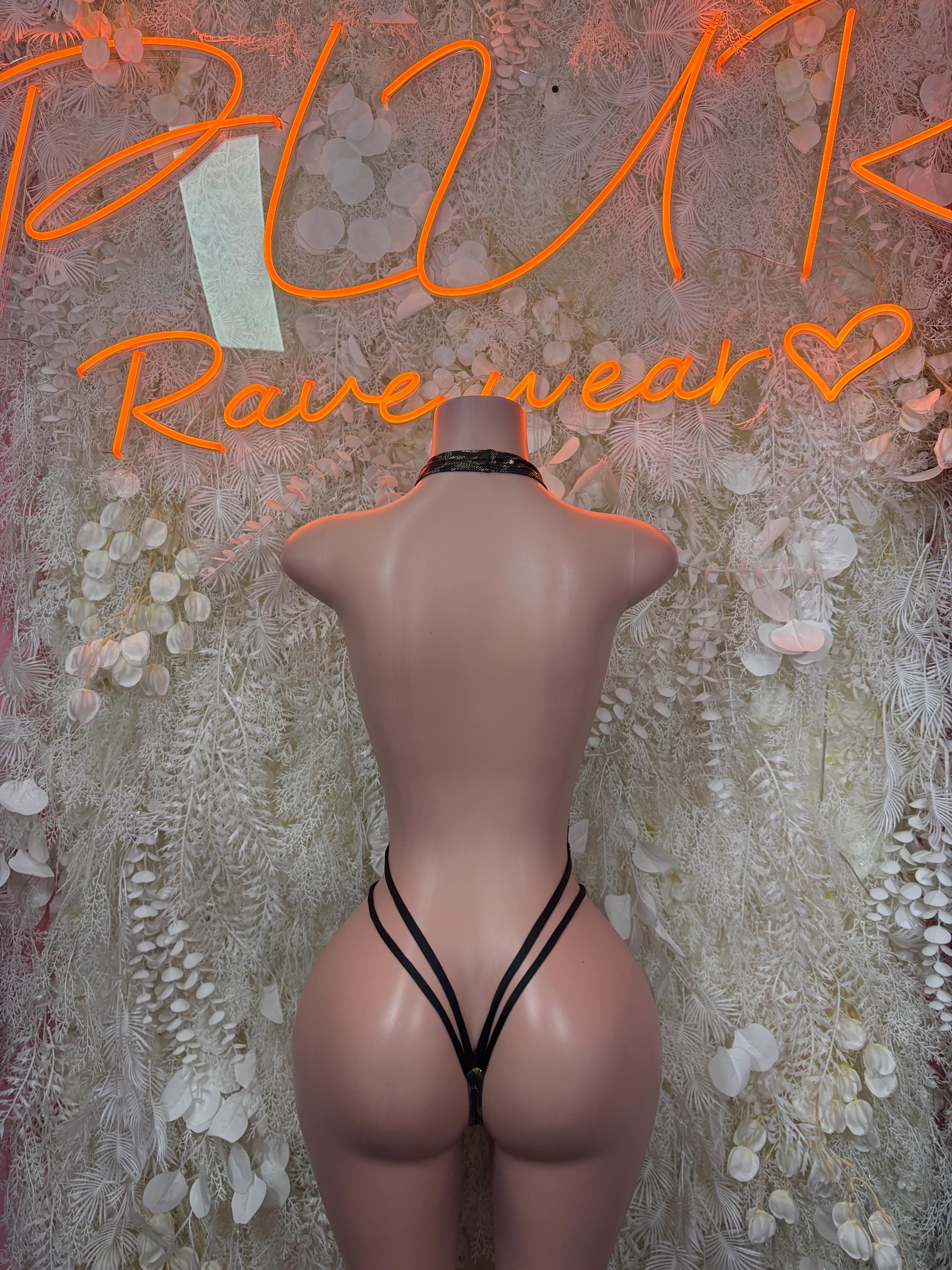 Leopard print string bodysuit with halter straps and plunging backless neckline