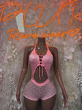Pink fishnet two-piece set with halter top and shorts, open back straps