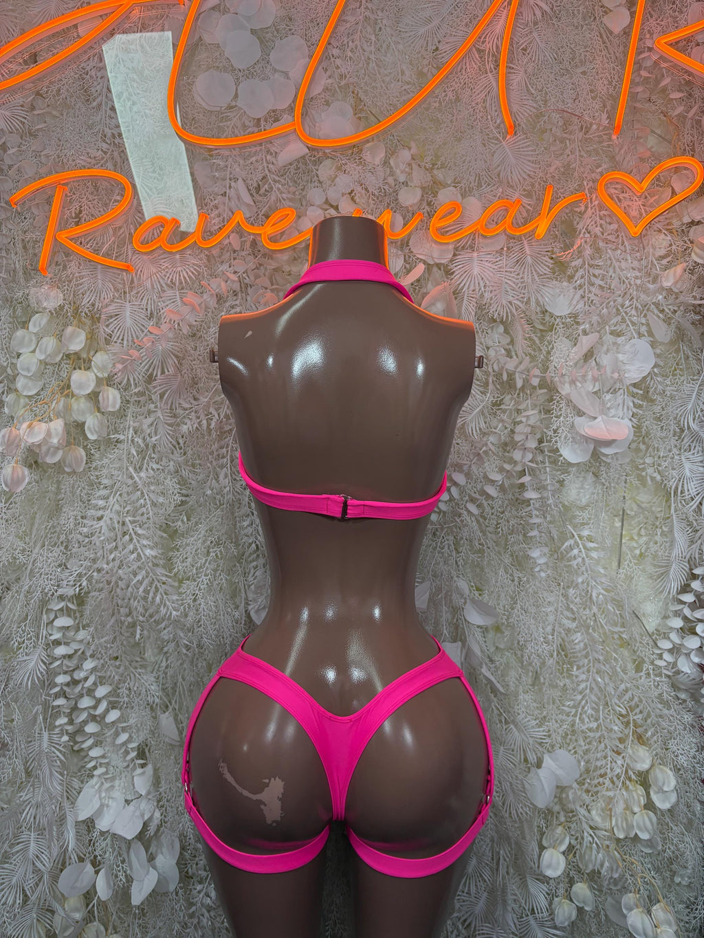 Hot pink two-piece rave bikini set, back view, triangle top with high-cut briefs