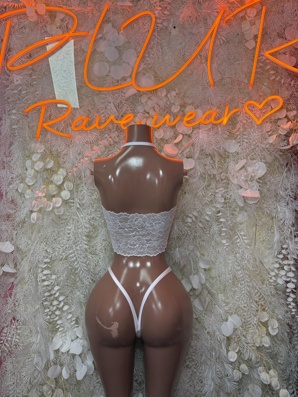 White lace-up halter bralette top and high-cut thong bottom with adjustable ties