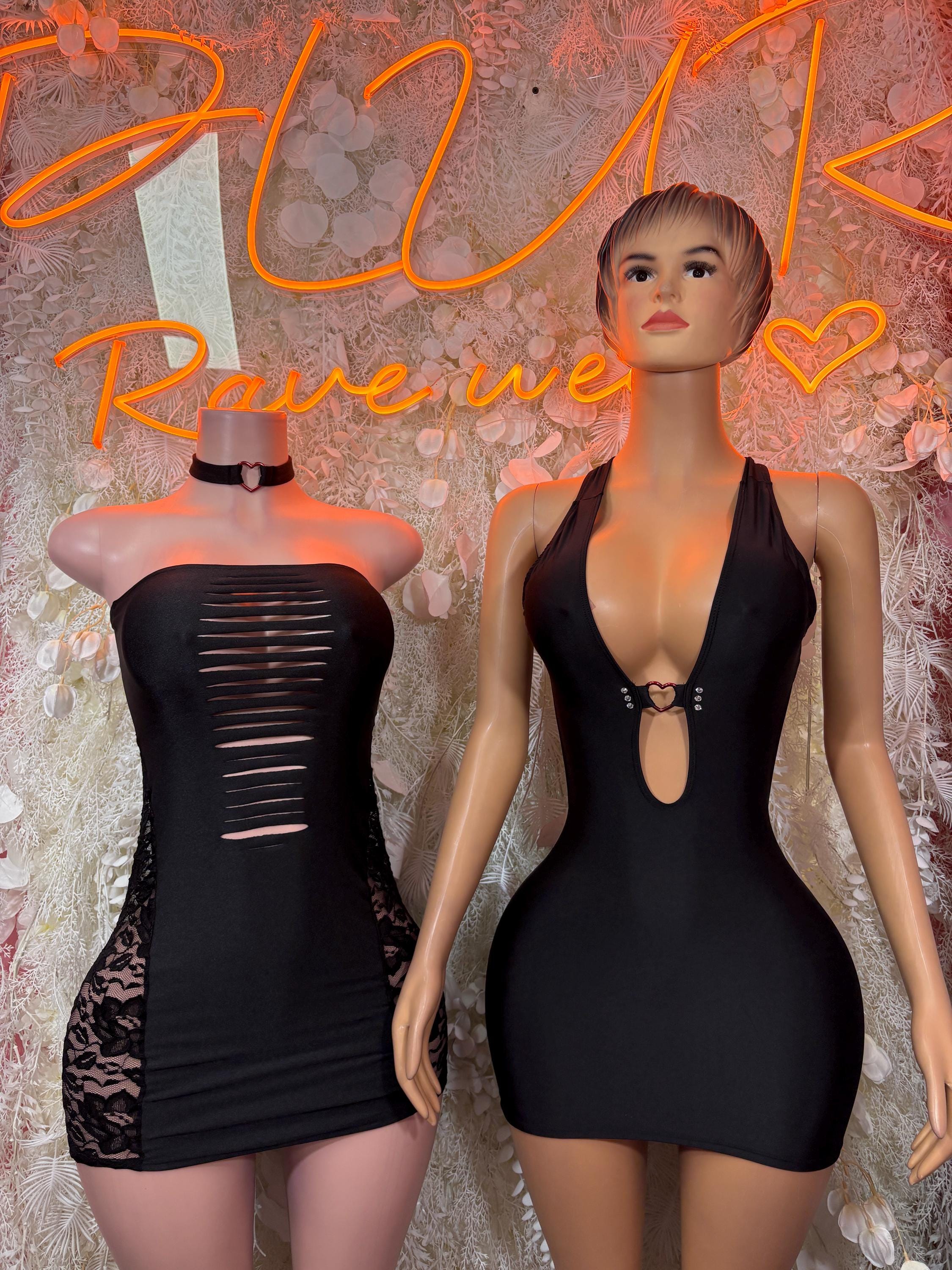 Black halter mini dress with keyhole cutout and lace hem
