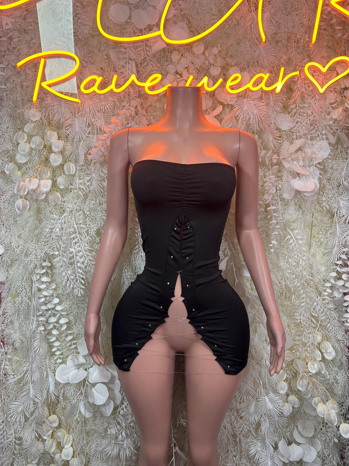 Black strapless mini dress with sweetheart neckline and ruched front with center seam