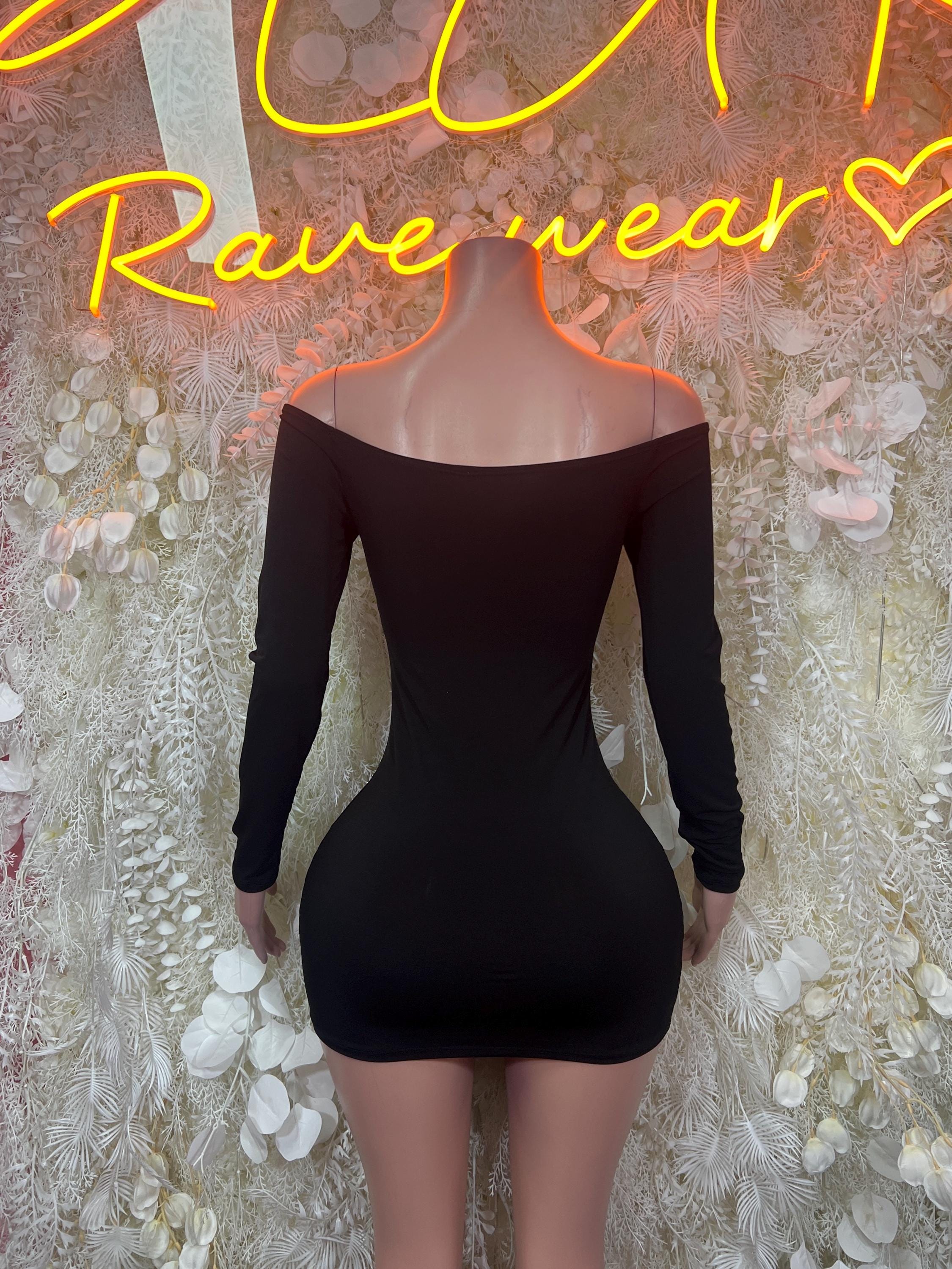 Black long-sleeve bodycon mini dress with chest oval cutout and ring detail