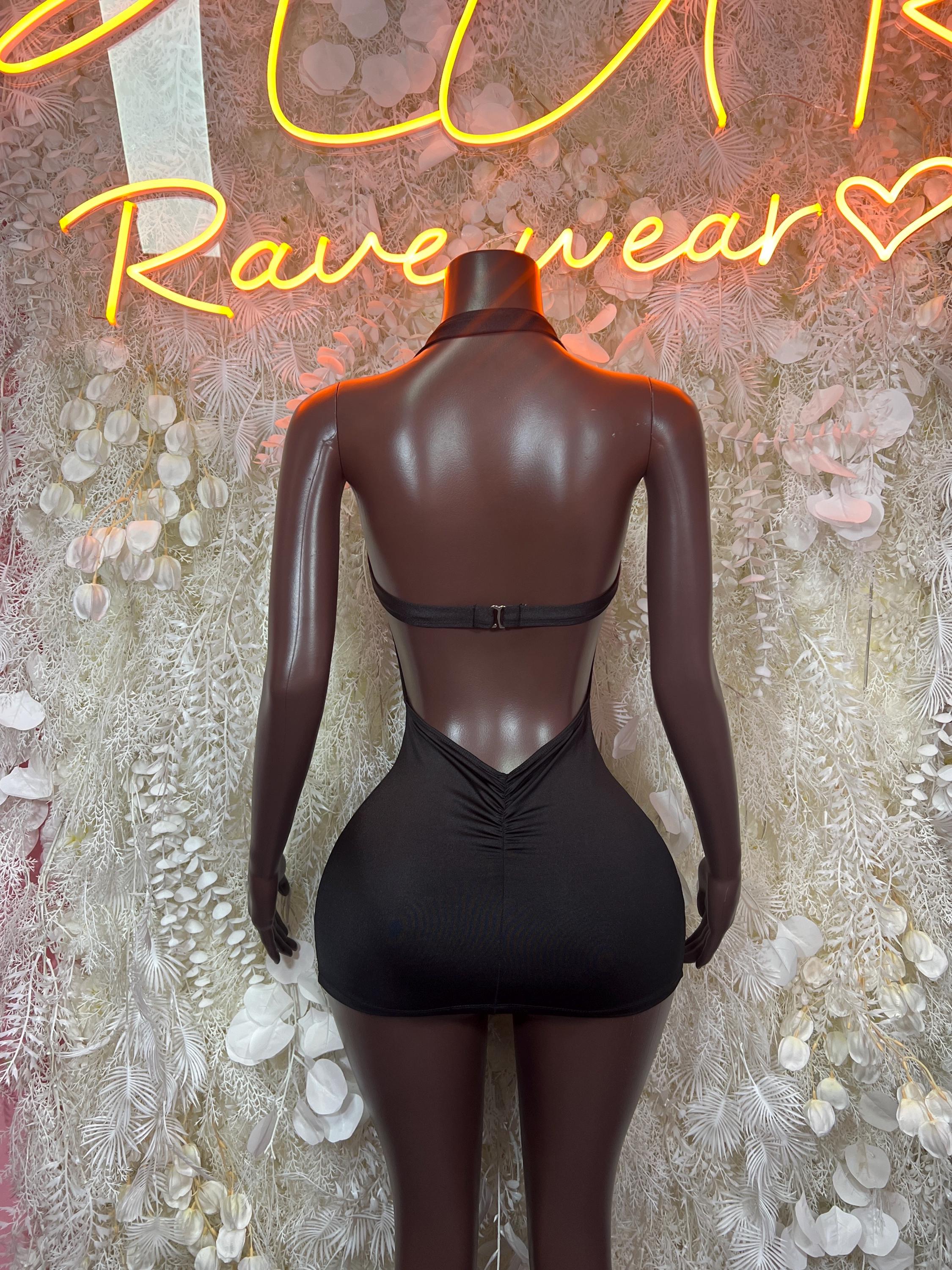 Black backless mini dress with thin straps and open racerback-style back