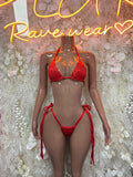 Red sparkle bikini set with triangle top and tie-string bottoms, adjustable straps