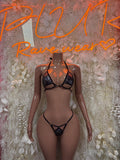Black strappy bikini set, underwire bra top and thong-style bottoms