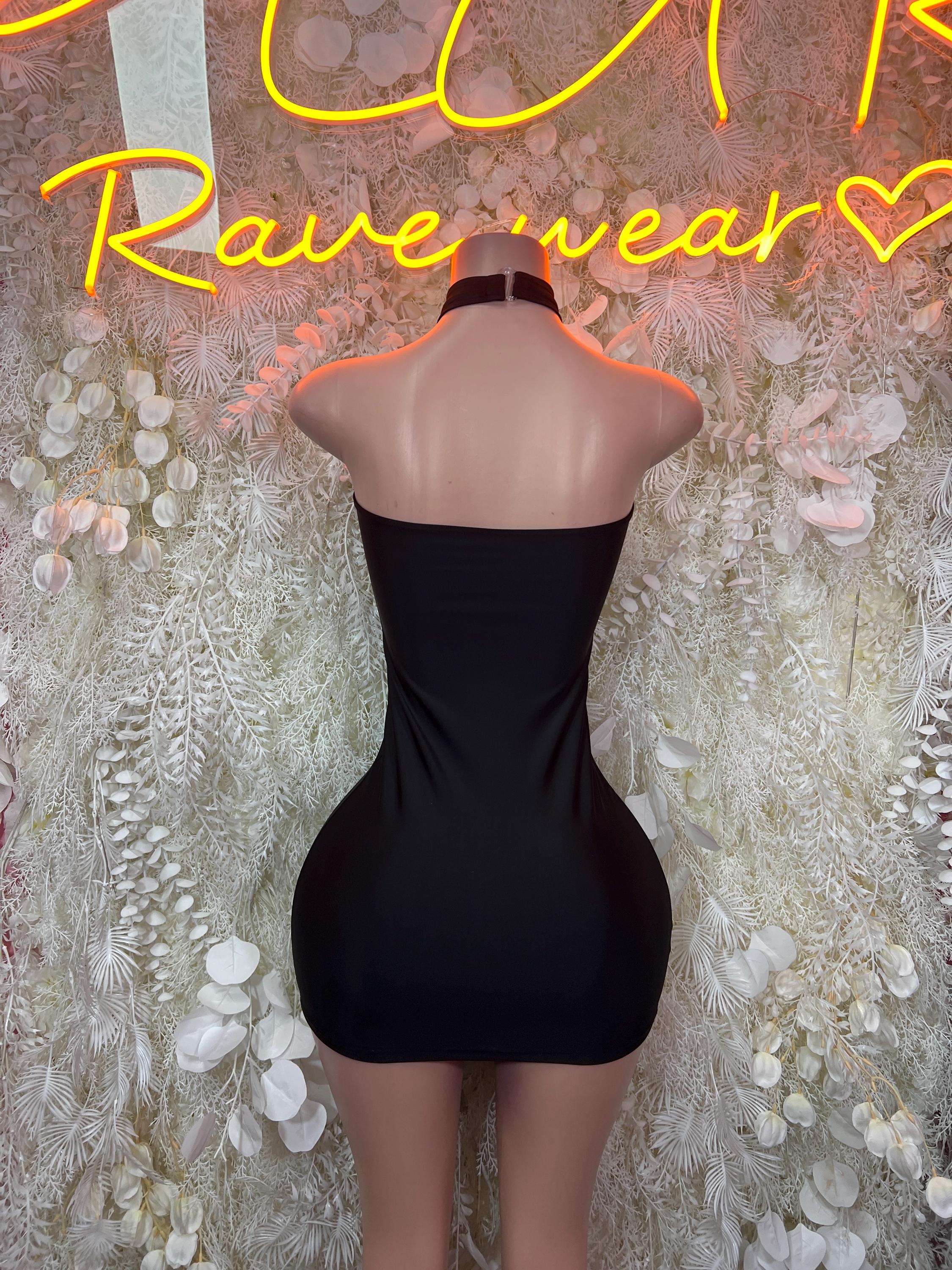 Black backless mini dress with halter straps and oval open back with sheer panel