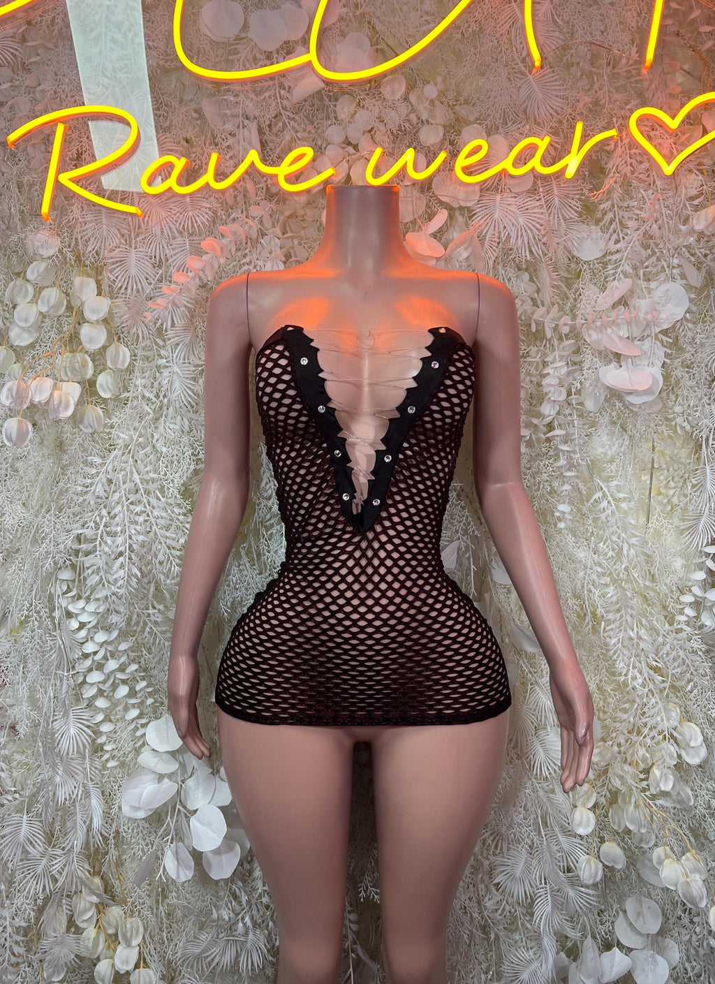 Black fishnet mini dress with deep V neckline
