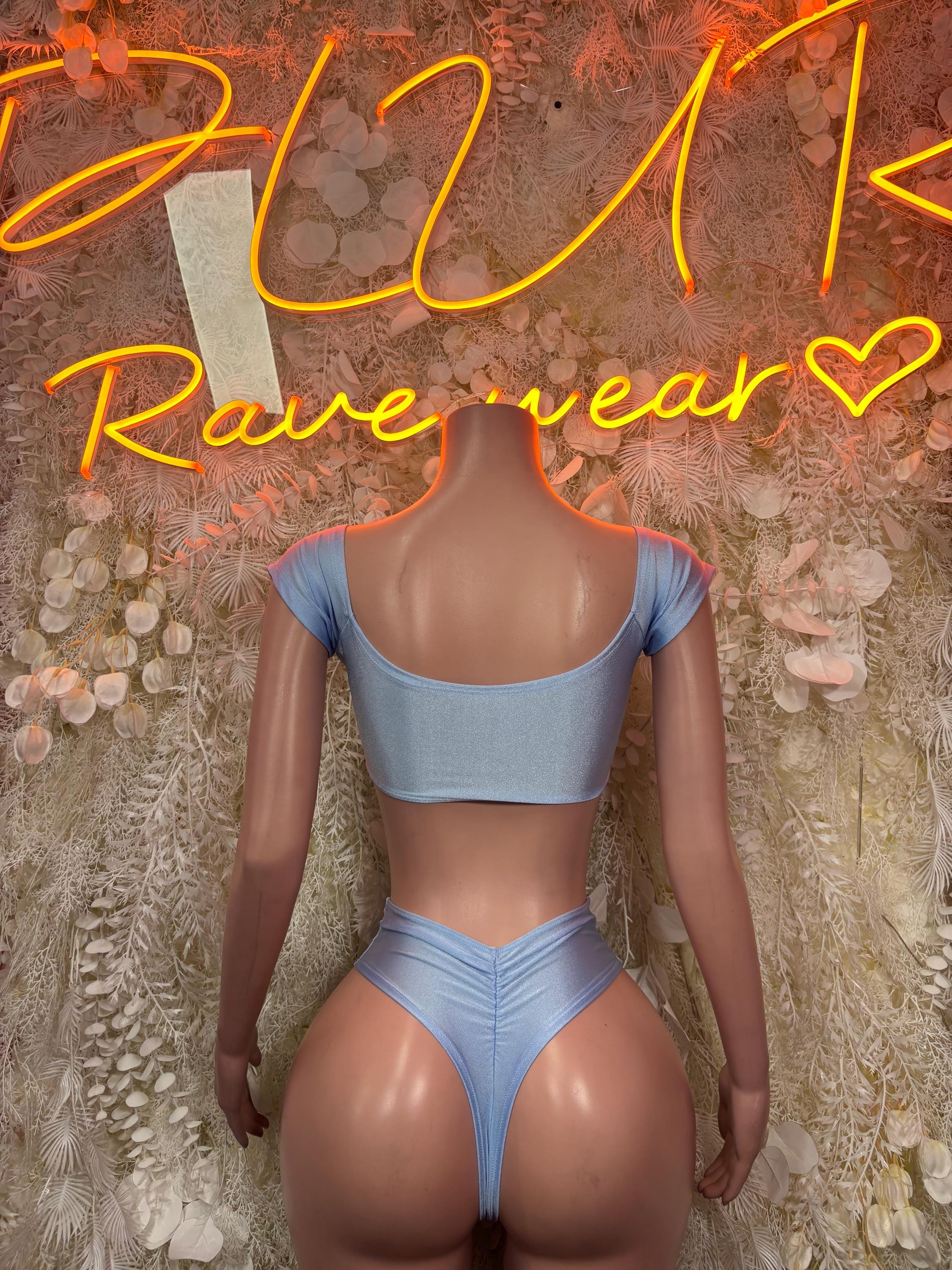 Light blue two-piece rave outfit back view with ruched crop top and high-cut bottoms