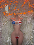 Two-piece bikini with red, white, and blue flag print, underwire, adjustable ties