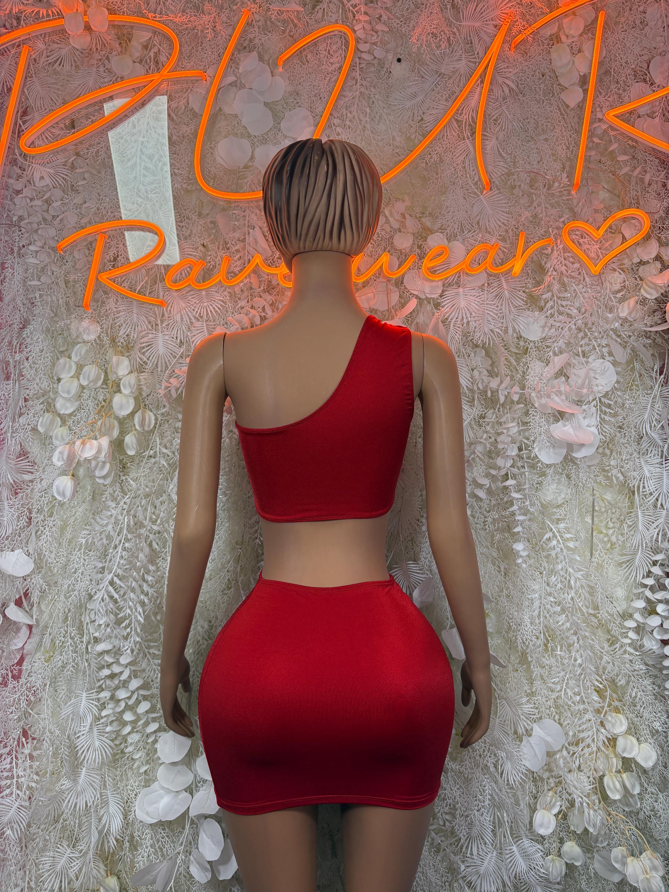 Red two-piece skirt set, back view: strappy bra top and fitted mini skirt