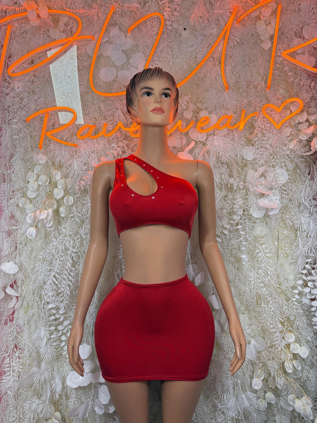Red strappy two-piece skirt set with cutout bra top and fitted mini skirt