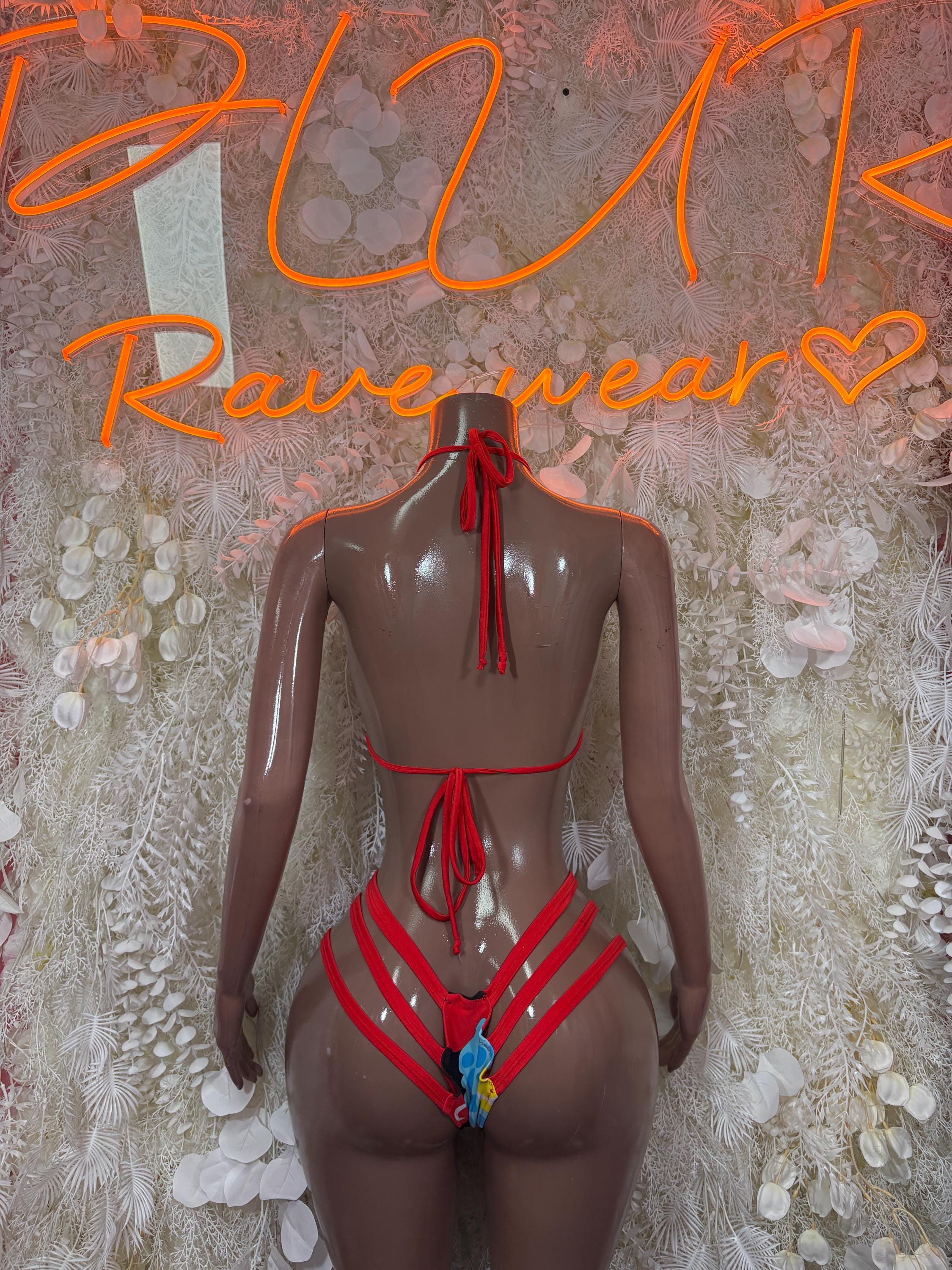 Rave two-piece set back view: red halter top with crisscross strap and tie, matching bottoms