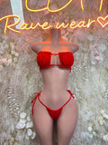 Red two-piece bikini swimwear set with bandeau top and tied string bottoms