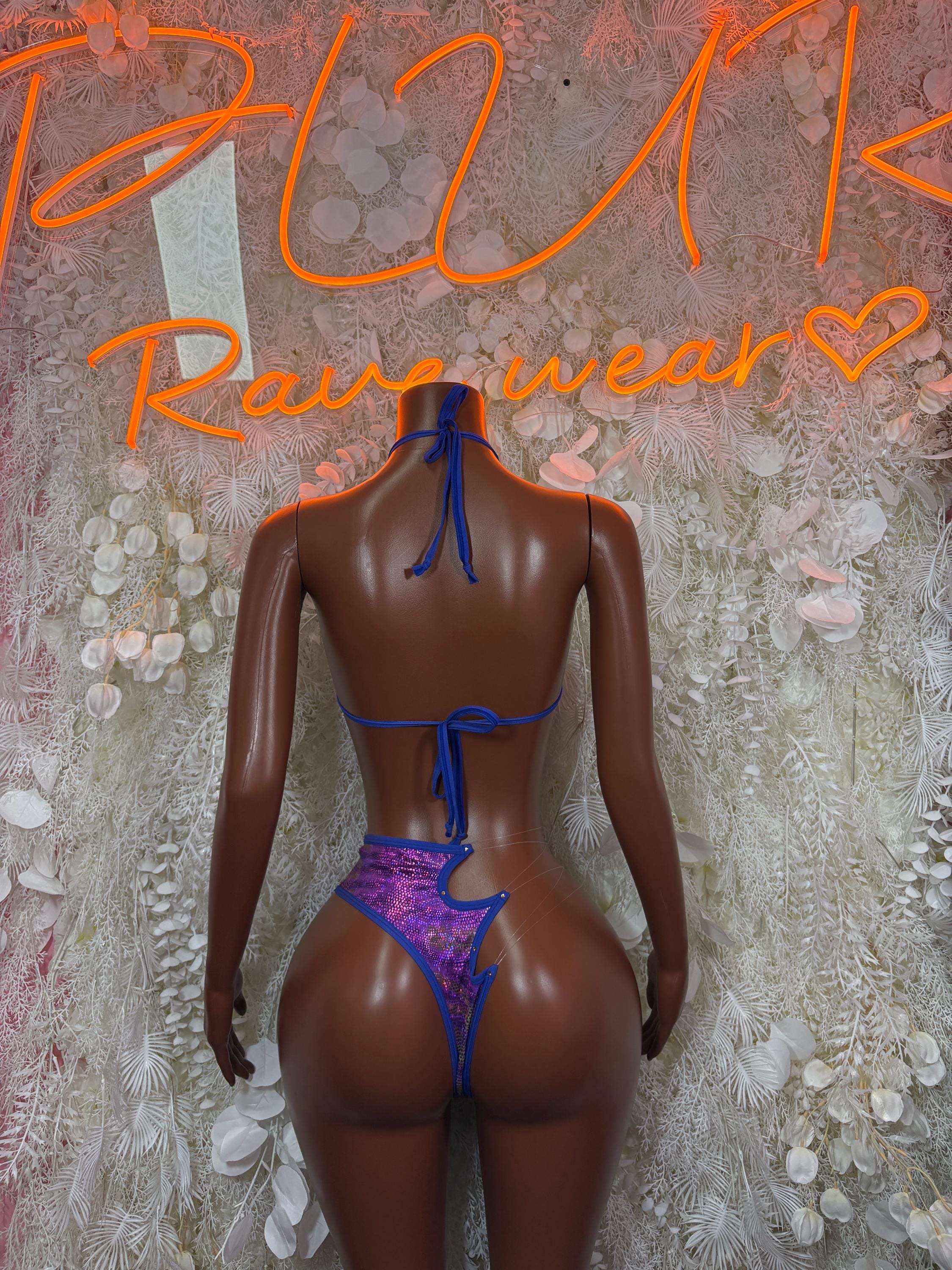 Purple metallic two-piece dance costume with blue strappy back and thong