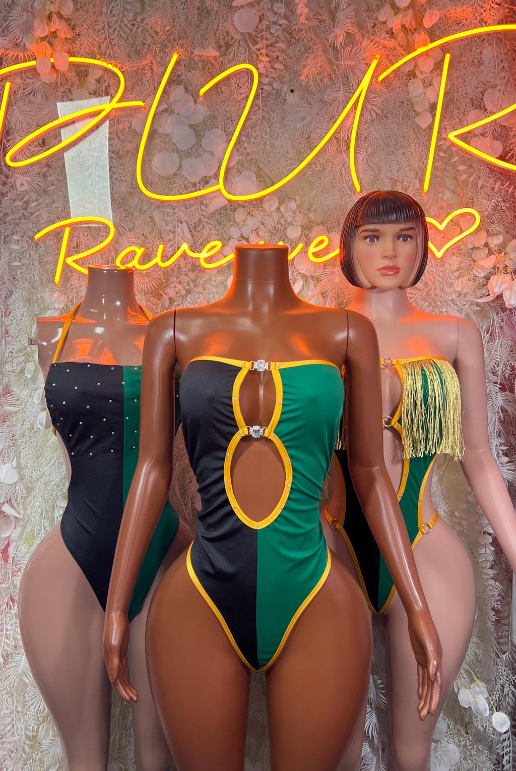 Jamaica flag bodysuit with green panel, yellow edging, and teardrop chest cutout