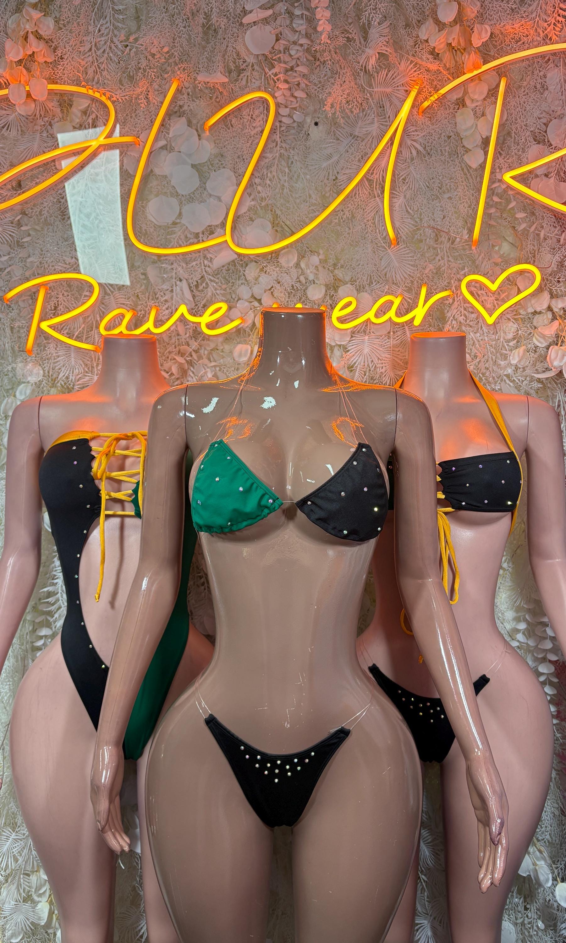 Jamaican flag-style two-piece bikini with green-and-black triangle top and black rhinestone bottoms