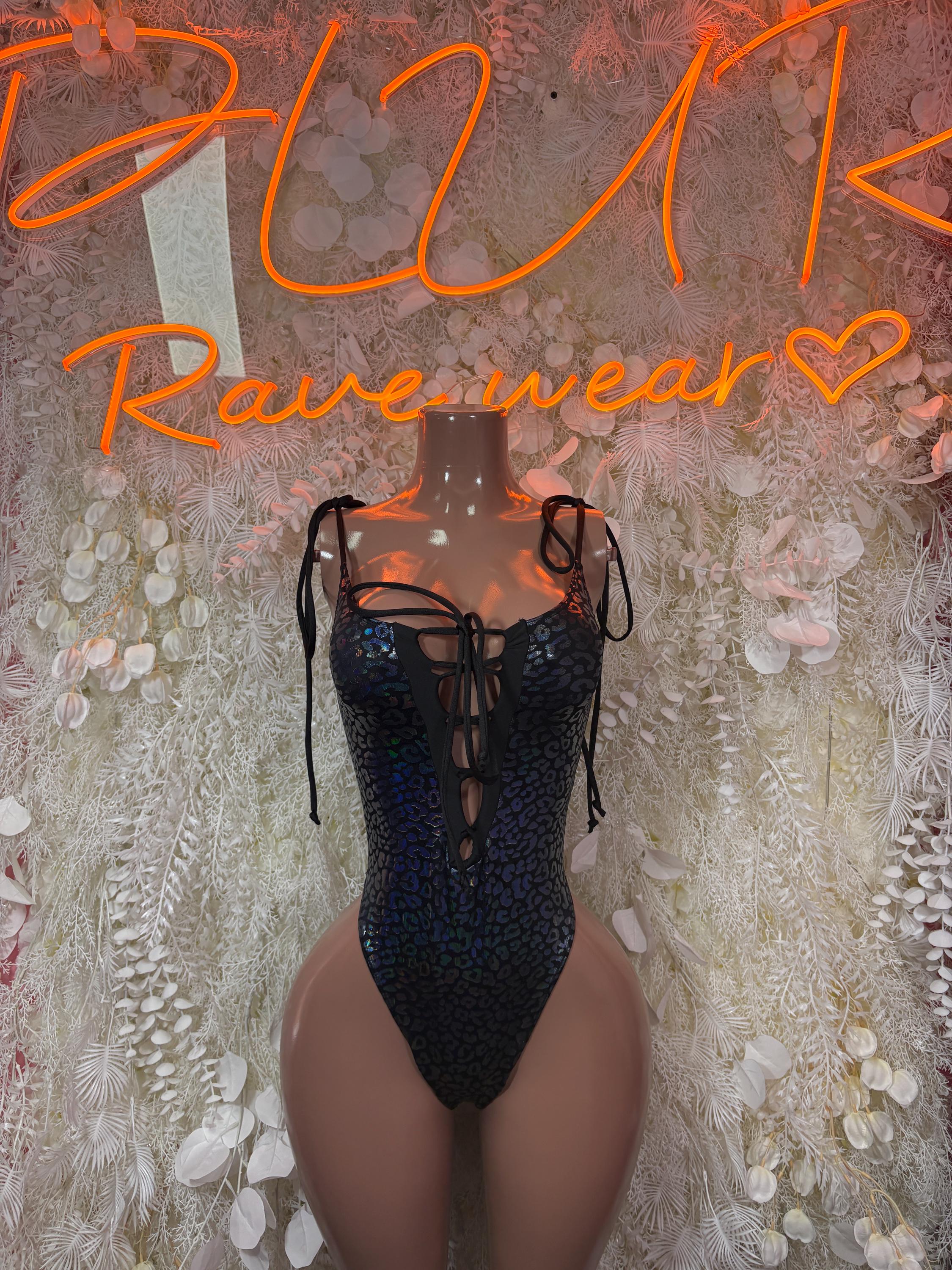 Black cheetah print bodysuit with lace-up back straps and eyelet cutout