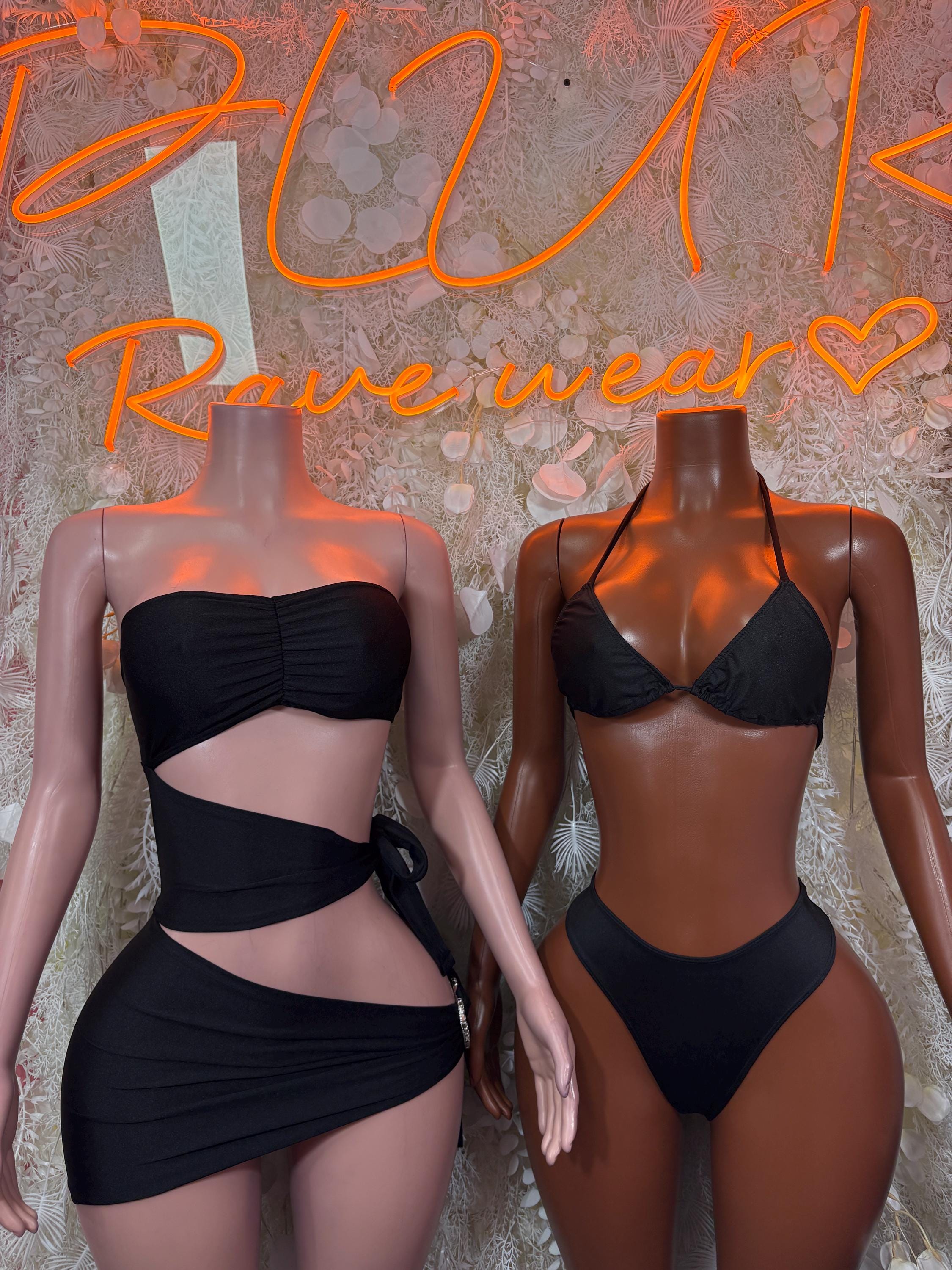Women’s black strapless cutout mini dress, shown front and back