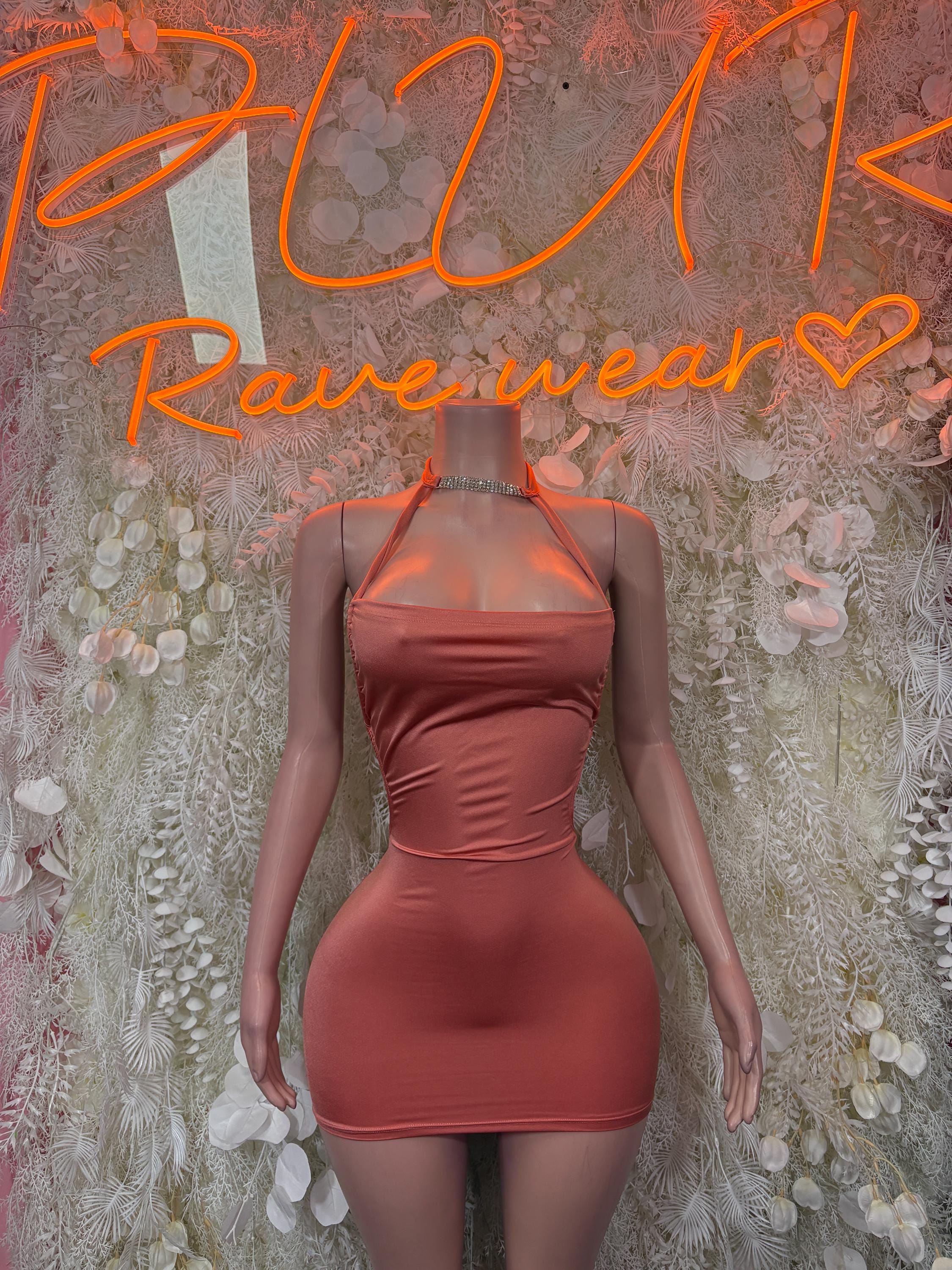 Coral halter neck bodycon mini dress with ruched front and open back