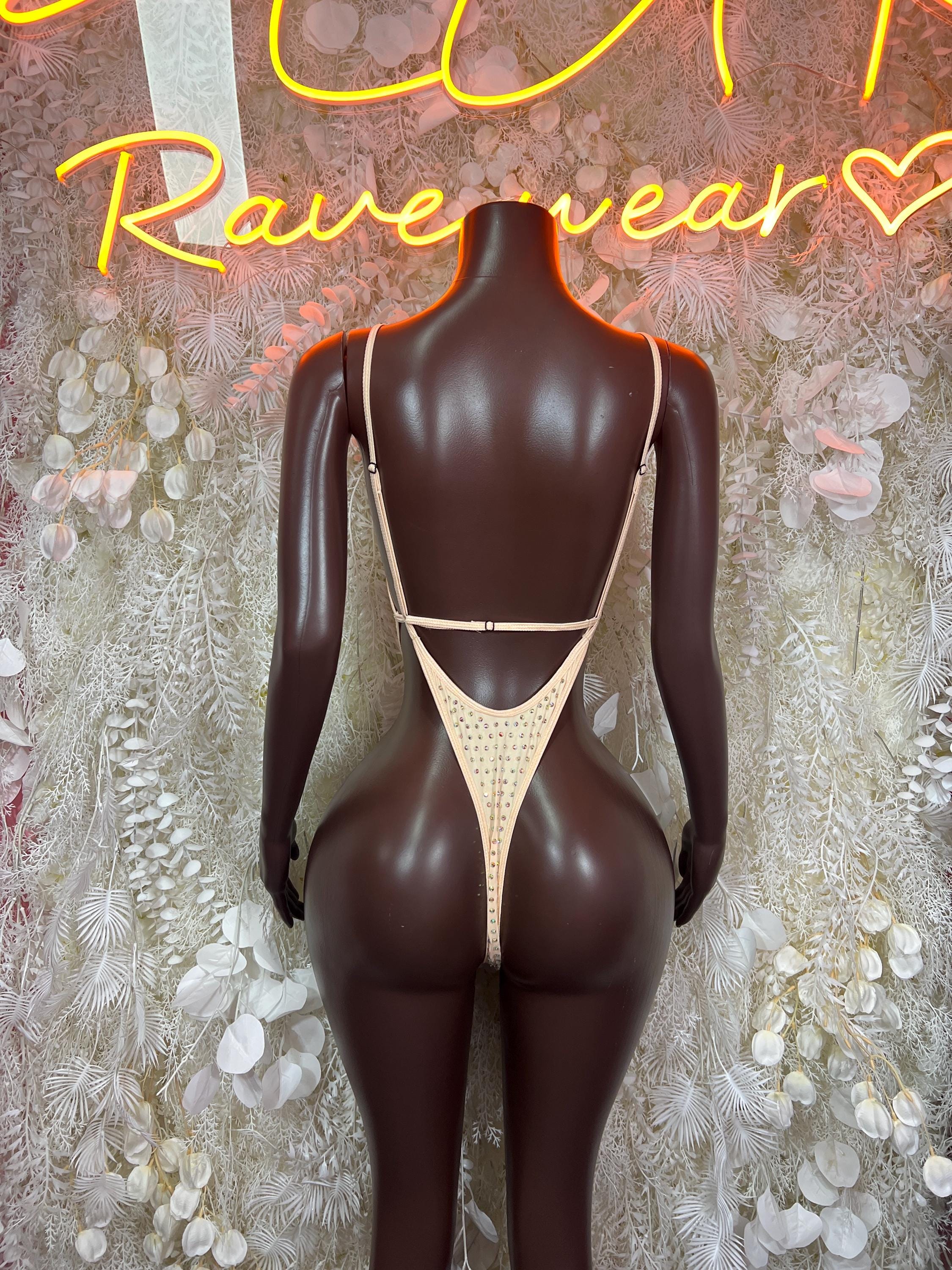 Rhinestone bodysuit with nude base, open back and thong-style cut