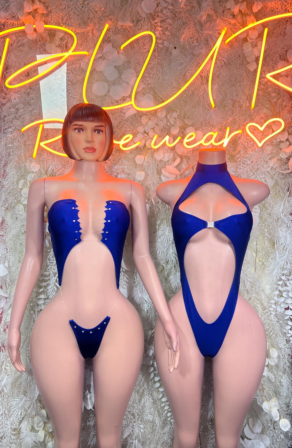 Royal blue one-piece bodysuit with front deep V, open oval back cutout, high-cut legs