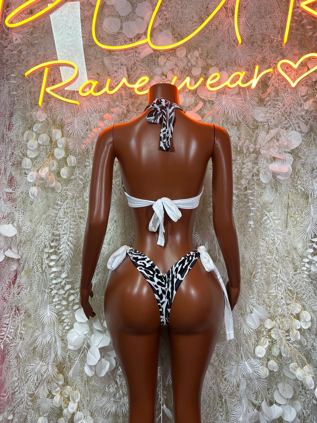 Zebra print two-piece swimwear with bow-tie back and ruffled side ties