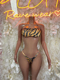 Two-piece tiger print bikini swimsuit with halter bandeau top and cheeky bottoms
