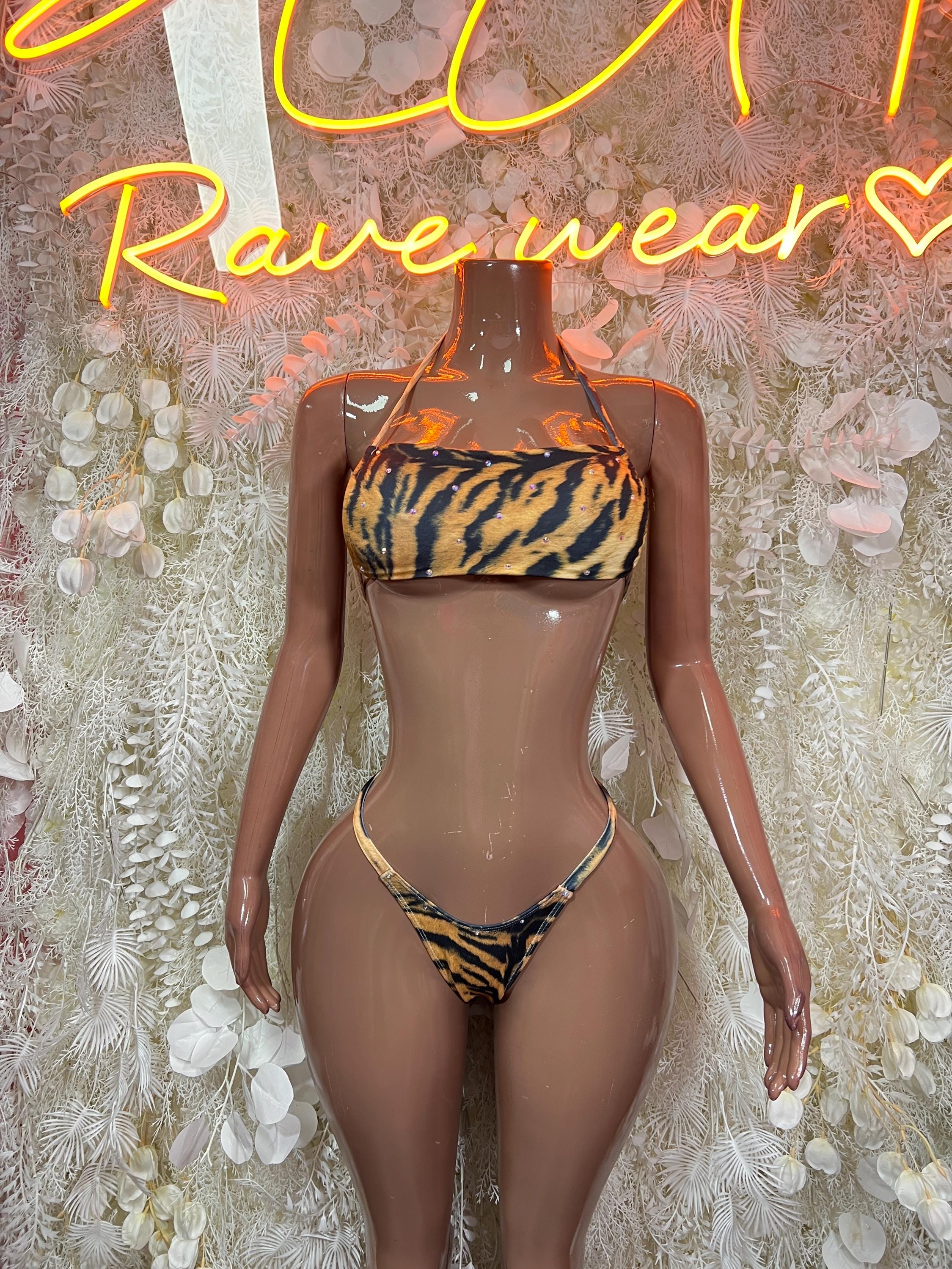 Two-piece tiger print bikini swimsuit with halter bandeau top and cheeky bottoms