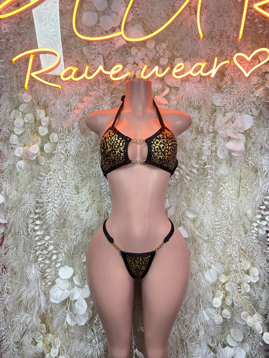 Cheetah-print black two-piece bikini with ring front and tie-back bottoms