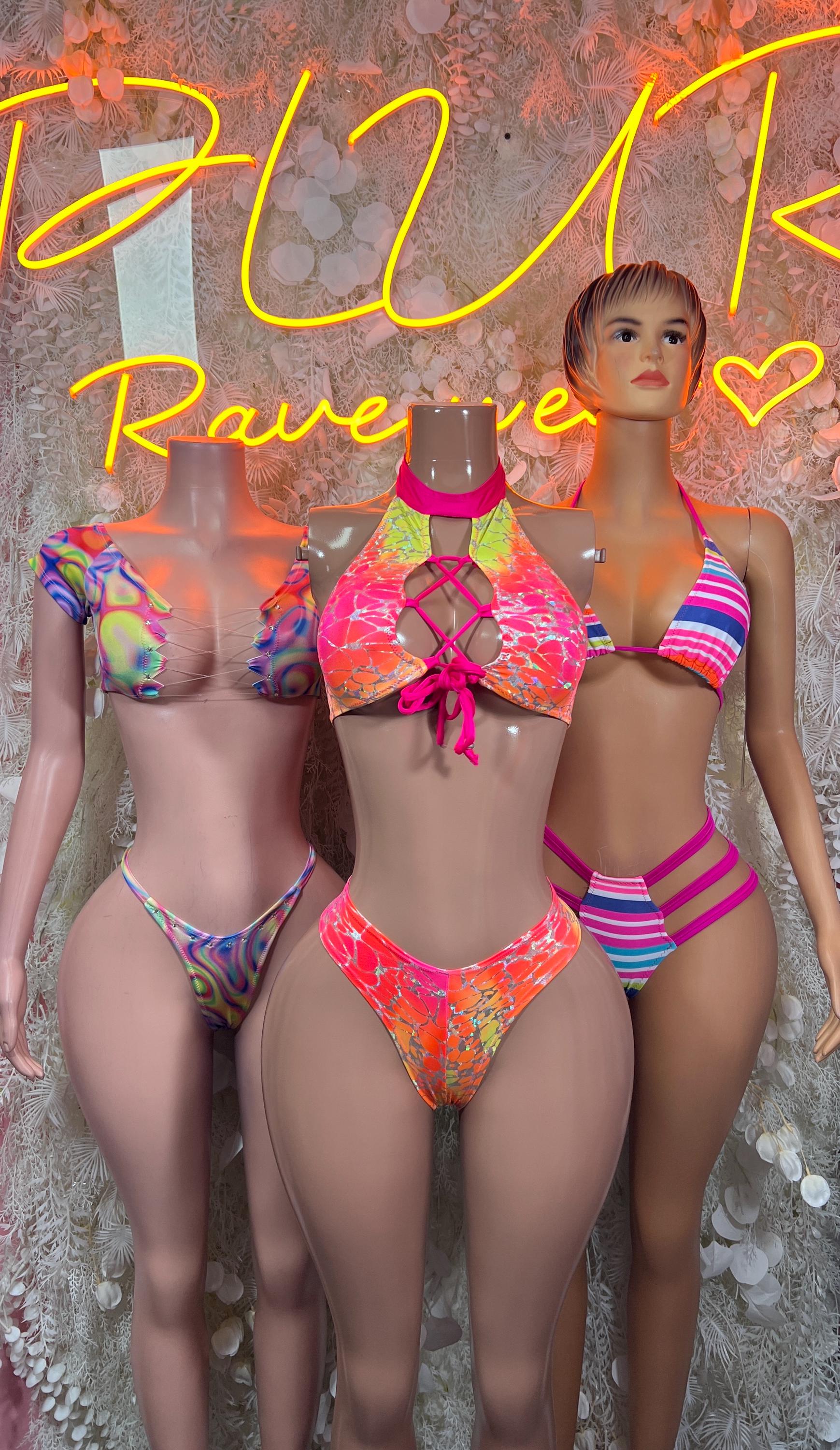 Multicolor trippy two-piece festival outfits on three models, cropped tops and bikini bottoms