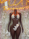 Gold cheetah print two-piece dancewear set with tie-back halter bra and thong